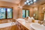Master Bathroom features Shower and Jetted Bathtub 